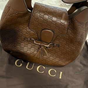 Gucci Embossed Brown Leather Hobo Bag. Size 14.5x13 Tall.